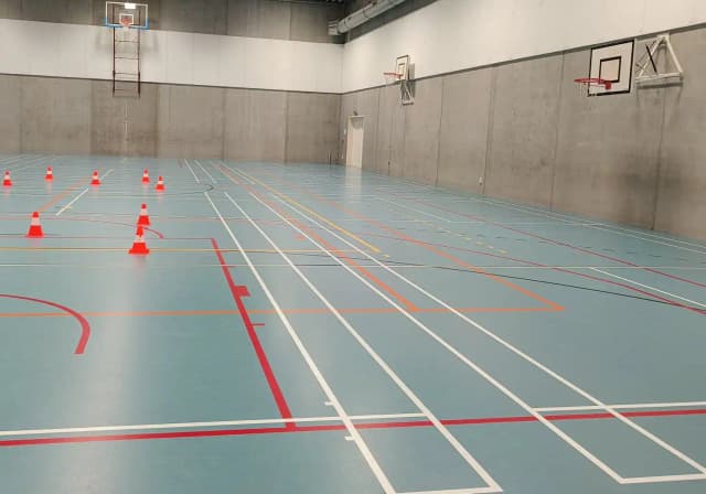 Enthousiaste ploeg met medailles